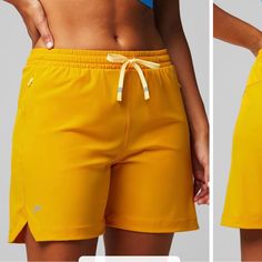 Made To Do It All. This Lightweight, High-Stretch Short Is Designed With A Breezy 5" Inseam. From Running To Relaxing, This Style Is Built For Every Day. Features Quick-Dry Moisture-Wicking Anti-Microbial Fabric 79% Nylon/21% Elastane Imported. Yoga Athletic Shorts With Go-dry, Yellow Yoga Activewear Shorts, Yellow Athleisure Athletic Shorts For Workout, Yellow Short Activewear For Yoga, Yellow Short Length Activewear For Yoga, Yellow Short Length Yoga Activewear, Yellow Activewear With Built-in Shorts For Workout, Athletic Shorts Women, Ribbed Shorts