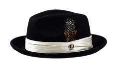 100% Wool Felt Color: Black Crushable Grosgrain Ribbon 2 1/4" Snap Brim 4 1/2" Crown White Hat Band 3-Pleat 1.5" Satin Add timeless style to any look with our classic Fedora Hat. Felt Dress, Black Fedora, Hat Size Chart, Wool Fedora, Dress Hat, White Hat, White Band, Dress Hats, Black And White Design