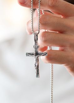 A Catholic Silver Cross is the perfect way to show your faith and devotion. This beautiful and intricate cross symbolizes the love and mercy of God. Crafted with exquisite attention to detail, it’s a stunning reminder of your faith that you can carry with you. Let it be a sign of your enduring faith. Sterling silverPendant: 65 x 35 mmBail size: 12.8 x 6.5 mmPlease note: pendant only; chain sold separatelyShown with: ROUND BOX SILVER CHAIN (2.6 MM) Processing time 1-3 business days Luxury Sterling Silver Cross Necklace, Spiritual White Gold Crucifix Cross Necklace, White Gold Crucifix Necklace Spiritual Style, Spiritual White Gold Crucifix Necklace, Engraved Cross Jewelry For Blessing, Luxury Silver Cross Necklace, Engraved White Gold Cross Necklace, White Gold Crucifix Necklace, Luxury Silver Cross Necklace As Gift