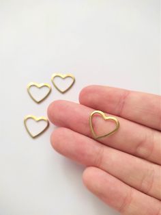 small heart shaped earrings in gold plated brass