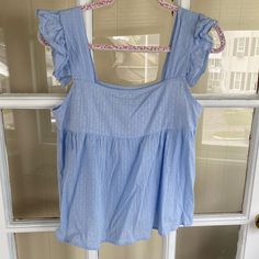 Size Medium, Never Worn. No Flaws Blue Summer Tops For Daytime, Spring Daytime Blue Blouse, Spring Blue Blouse For Daytime, Blue Sleeveless Blouse For Brunch, Chic Blue Blouse For Daytime, Sleeveless Blue Blouse For Brunch, Blue Tops For Daytime Spring, Blue Tops For Daytime In Spring, Chic Blue Tops For Daytime