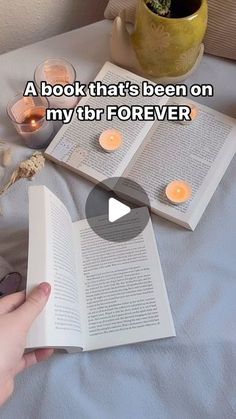 someone is reading a book that's been on my bed for ever? video