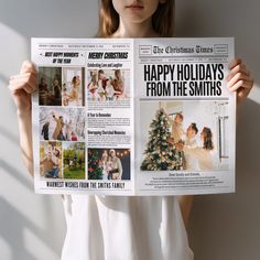 a woman holding up a newspaper with pictures of people around the christmas tree on it