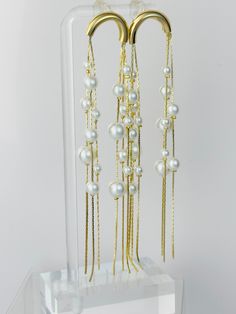 Experience the glamour and beauty of our 18k Gold-Plated 4" Earrings, boasting an exquisite display of cascading pearls. These earrings are a show-stopper without weighing your ears down. 4 Earrings, Gold Choker, Gold Studs, Bag Straps, Silver Gold, 18k Gold, Pearl Earrings, Gold Plate, Plating