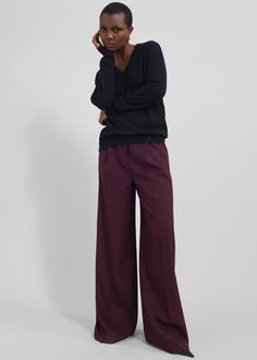 Color: Black Midweight cashmere knit fabric Regular fit V neck Loulou Studio seashell embroidered on the lower left side Rib knit trim Slip-on style Unlined 100% Cashmere Dry Clean By Loulou Studio. Imported Burgundy Trousers, Feminine Office, Burgundy Pants, Loulou Studio, Slacks For Women, The Frankie Shop, Frankie Shop, Red Shirt, Work Pants