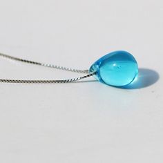 FREE Shipping Worldwide: With the combination of fashionable simple design, this necklace is just the thing to make any woman feel special. An elegant and generous visual enjoyment for you and the ones you love. This charm necklace is an excellent gift for anniversaries, gatherings, brides, wedding party, holiday, graduations, birthdays, Christmas. Material: Glass Why shop with us? ✓ Over 40,000+ Happy customers! ✓ 30 Day money back guarantee ✓ Tracking number for every order ✓ Encrypted SSL for Elegant Blue Crystal Necklace For Gift, Blue Round Pendant Jewelry For Her, Elegant Blue Crystal Necklace With Clavicle Chain, Elegant Light Blue Drop Jewelry, Blue Round Pendant Jewelry Gift For Her, Elegant Blue Teardrop Necklace, Elegant Blue Pendant Crystal Necklaces, Elegant Blue Crystal Pendant Necklace, Blue Clavicle Chain Necklace For Wedding