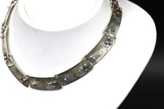 Vintage  Handmade Silver Brutalist Women's Choker Necklace Total weight: 57.78 grams  DON'T FORGET TO FAVOURITE OUR SHOP TO STAY UP-TO-DATE ON OUR LATEST ESTATE CLEARANCES & FINDINGS. MAKE SURE TO CHECK OUT OUR LATEST VINTAGE JEWELRY COLLECTION! Designer name jewelry, custom jewelry & much more! Make sure to follow our shop on Etsy for our latest Estate clearances and findings!  #vintage_montreal_jewelry (insta) OFFERS ACCEPTED ON SELECTED ITEMS ONLY. SEND ME AN OFFER WITH YOUR LOCATION AND I'LL GET BACK TO YOU ASAP Designer Hallmarked Jewelry For Collectors, Designer Polished Finish Necklaces For Formal Occasions, Designer Metal Necklaces For Gifts, Designer Engraved Necklaces For Formal Occasions, Hammered Metal Jewelry For Formal Occasions, Artisan Metal Jewelry With Polished Finish, Handmade Silver Custom Necklace For Formal Events, Designer Metal Jewelry For Gifts, Designer Metal Jewelry As Gift