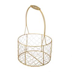 a gold wire basket with a handle