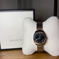 Never Been Worn, New In Box Gucci Timeless Black Watch, Gucci Black Luxury Watch, Black Gucci Timeless Watch, Black Gucci Watch With Subdials, Gucci Watches With Subdials For Gift, Modern Black Gucci Watch, Designer Black Gucci Watch, Gucci Luxury Business Watch, Designer Gucci Watch For Evening