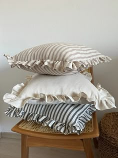 three pillows stacked on top of each other