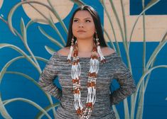 Hello there, I'm thrilled to share with you a piece of my heart and heritage - my Traditional Native American Necklace and Earrings Set, inspired by the ceremonial women's dance necklaces of the Hupa and Karuk Indigenous peoples. This creation is much more than jewelry; it's a celebration of culture, tradition, and the artistry passed down through generations. I meticulously handcraft each 5-strand necklace, incorporating double dentalium in every strand, resulting in a stunning display of one hundred one and a half inch smooth dentalium shells. To enhance its beauty and significance, I've adorned it with mother of pearl discs and cedar berries, all locally sourced from fellow Indigenous peoples of the Pacific Northwest region. The brown pine nuts, gathered and prepared by my own hands, ad Native American Dentalium Necklace Shop, Spiritual Beaded Jewelry For Traditional Ceremonies, Spiritual Jewelry For Traditional Ceremonies And Festivals, Handmade Necklaces For Traditional Ceremonies, White Artisan Jewelry For Festivals, Artisan White Jewelry For Festivals, Hand-strung White Jewelry For Festivals, Bohemian Jewelry For Traditional Ceremonies, Traditional Hand-strung Earrings For Gifts