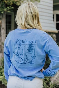 A Lakegirl.com exclusive. One of our most popular items is back, although for a limited time. Comfortable, periwinkle, and Lakegirl. Does it get any better? 100% cotton Relaxed Fit Size Chart Light Wash Cotton T-shirt, Light Wash Soft-washed Cotton Tops, Blue Soft-washed Long Sleeve T-shirt, Spring Long Sleeve Washed T-shirt, Blue Washed Cotton Tops, Blue Washed Cotton Top, Cute Soft-washed Blue Tops, Blue Washed Graphic Tee, Washed Cotton Long Sleeve T-shirt