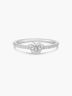 This cute and tiny 5mm Cubic zirconia butterfly lies on a 1.3mm gold or rhodium plated band. Butterflies have so many meanings. From personal, to superstitious, you may just even like butterflies. This butterfly ring is perfect for you! It is so simple yet trendy. We can't get enough of butterflies.Material: Gold, Rose Gold, Rhodium Plated Band Size: 5mm CZ Super Trendy and Elegant Butterfly Cubic Zirconia Wedding Rings, Butterfly-shaped Cubic Zirconia Wedding Rings, Silver Butterfly Rings With Diamond Accents, Diamond White Cubic Zirconia Butterfly Promise Ring, White Gold Butterfly Ring With Diamond Accents, Butterfly-shaped Diamond Ring For Gift, Butterfly-shaped Diamond Ring Gift, Adjustable White Butterfly Ring, Dainty Rings With Butterfly Charm