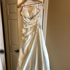 New Never Worn, Sample Dress. This Piece Has Been All Hand Beaded, There Are A Couple Pieces Loose Which Can Be Put Back Very Easily. Will Need A Dry Cleaning Before Wears. Color Ivory Cream Silk With Next Underlay To Give Volume. Size 8. The Body Also Has Boning Inside To Support. Open To Reasonable Offers. Satin Wedding Dress With Sweep Train, Wedding Dress With Ruched Bodice Ball Gown, Embellished Satin Ball Gown With Fitted Bodice, Floor-length Evening Dress With Lined Bodice For Wedding, Floor-length Wedding Dress With Lined Bodice, Formal Satin Wedding Dress With Sweetheart Neckline, Satin Gown With Sweep Train For Wedding, Silk Wedding Dress With Ruched Bodice, Wedding Evening Dress With Sweep Train In Satin