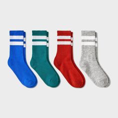 This Boys' 4pk Striped Crew Socks - Cat & Jack™ makes a cozy addition to your kid’s everyday wardrobe. Crafted from a soft knit fabric with spandex for stretchy comfort, these ankle socks are easy on the feet for prolonged wear. The pack includes four pairs in solid multi color neutrals giving you plenty of options for pairing with their everyday outfits. Cat & Jack™: Designed for all children so you can trust it's made for yours. Cotton Socks For Winter Playtime, Casual Winter Socks For School, Sporty Multicolor Cotton Socks, Casual Cotton Socks For Playtime, Sporty Multicolor Socks For Winter, Sporty Multicolor Winter Socks, Multicolor Casual School Socks, Casual Multicolor School Socks, Space Socks