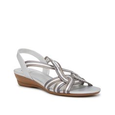 Impo-Ravi Wedge Sandal Keep it classic with the Ravi wedge sandal from Impo. This pair features interwoven elastic straps for a secure fit and a wedge heel for sturdy steps. Silver Wedge Sandals With Cushioned Footbed, Silver Wedge Heel Sandals With Removable Insole, Casual Silver Wedge Heel Sandals, Wedge Sandal, Wedge Heels, Wedge Sandals, Metallic Silver, Wedges, Elastic