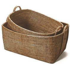 two woven baskets sitting on top of each other