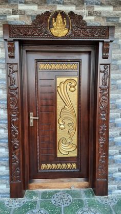 a wooden door with decorative carvings on it