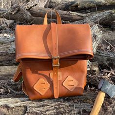 "This beautiful, all leather backpack is made using a soft & pliable full-grain leather for the body. All of the straps and handles are made using full grain bridle leather. This all-purpose backpack is the perfect size for any hiking / backpacking trip or even school! Seams are double stitched and all rivets are hand-peened solid brass for superior strength. The bag includes two lashing tabs on the front at the bottom for attaching additional bags or equipment. Buckles are brass with roller Leather Shoulder Bag Backpack For Outdoor Activities, Leather Satchel Backpack For Outdoor Activities, Leather Backpack Shoulder Bag For Outdoor, Leather Shoulder Bag With Waxed Finish For Outdoor, Leather Backpack For Outdoor, Leather Shoulder Bag Backpack For Outdoor, Leather Satchel Shoulder Bag For Outdoor Activities, Outdoor Leather Standard Backpack, Everyday Carry Soft Leather Backpack