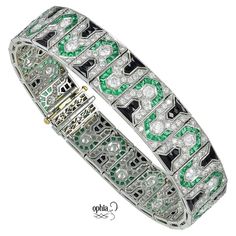 Sophia D Art Deco inspired platinum bracelet that features 4.59 carats of diamond and 6.69 carats of green emerald with onyx. Sophia D has been known world-wide for over 40 years because of its rich history of design and quality craftsmanship. From art deco to antique reproduction, these timeless pieces, when merged with modern manufacturing techniques, create a perfect harmony between old and new Luxury Art Deco Engraved Bracelets, Emerald Art Deco, Emerald Art, Platinum Bracelet, Emerald Bracelet, Art Deco Inspired, Green Emerald, Inspiration Art, Art Deco Design