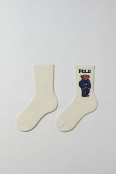 So soft socks from Polo Ralph Lauren with their signature bear design. Cut in an essential crew length. Content + Care 60% Cotton, 21% nylon, 17% polyester, 2% spandex Machine wash Imported Size + Fit Crew length | Polo Ralph Lauren Americana Sport Bear Crew Sock in Ivory, Women's at Urban Outfitters Crew Socks Aesthetic, Kk Gift Ideas, Polo Ralph Lauren Socks, Ralph Lauren Bear Socks, Cute Crew Socks, Gifts Under $50, Polo Bear Socks, Cute Socks Aesthetic, Stocking Stuffers Women