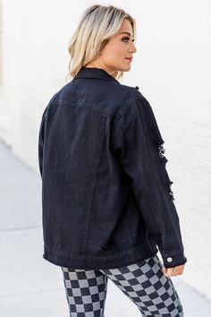 This cute black oversized jean jacket is perfect for any chilly night out this season. We are loving the distressing throughout and light wash style. We also love the relaxed fit, pockets, and frayed hem. It will be a must have in your closet for every season. Pair this jacket with a tank dress or wear it over a bodysuit and a skirt! Oversized fit in bust 100% cotton Fabric has no stretch Unlined Size small from shoulder to hem: 25.5" Hand wash cold, line dry Patterns may vary Materials may have Edgy Washed Black Denim Jacket, Black Washed Edgy Denim Jacket, Light Wash Outerwear With Frayed Hem For Day Out, Oversized Edgy Cotton Denim Jacket, Dark Wash Denim Jacket With Frayed Hem For Streetwear, Edgy Denim Jacket With Frayed Hem, Washed Black Grunge Denim Jacket For Spring, Edgy Medium Wash Denim Jacket, Grunge Washed Black Denim Jacket For Spring