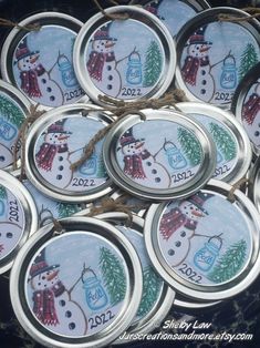 snowman ornament on mason jar lids with rope