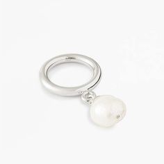 Nova ring in sterling silver with freshwater pearl.    - band width: 3.5mm  - pearl diameter: 12mm  - fit: true to size  - nickel free rhodium plating  - base metal is recycled sterling silver  - handcrafted in high polish  - every pearl is unique in shape and color  - myw05ss217pl Sterling Silver White Gold Pearl Ring With Pearl Drop, Sterling Silver Pearl Drop Ring In White Gold, White Gold Pearl Drop Ring In Sterling Silver, Silver Pearl Ring With Pearl Drop, Silver Pearl Drop Ring, White Gold Sterling Silver Rings With Pearl Drop, Sterling Silver Pearl Drop Ring, White Gold Sterling Silver Open Pearl Ring, Modern White Gold Sterling Silver Pearl Ring