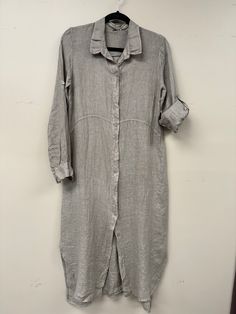 An effortless addition to elevate your summer wardrobe, our Italian linen long button-down shirt dress is crafted of light yet durable linen. The relaxed, boyfriend silhouette and rolled-up long sleeves make it perfect for those in-between days, while two pockets add a practical yet stylish touch. Wear it open or buttoned for a sophisticated, artfully-crafted look. 2454 Slip Dress Linen Shirt, Linen Long Sleeve Shirt Dress With Button Closure, Classic Linen Shirt Dress With Spread Collar, Collared Beige Linen Shirt Dress, Beige Linen Collared Shirt Dress, Beige Collared Linen Shirt Dress, Linen Button-up Shirt Dress With Pockets, Beige Linen Button-up Shirt Dress, Linen Shirt Dress With Button Closure For Fall