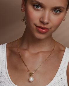 Mother Nature, upping your style game since forever. A classic chain never goes out of style, but add a perfect pearl and a toggle detail and you’ve got a necklace you’ll never want to take off. DETAILS: Pendant Necklace Length: 22" Front Toggle Closure SKU: N6226 MATERIALS: 18k Gold Plated Over Brass Shell Pearl Melinda Maria Jewelry, Brass Shell, Pearl Pendant Necklace, Gold Pendant Necklace, Holiday Gift Guide, Pearl Pendant, Out Of Style, Quality Jewelry, Shop Necklaces