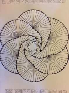 an intricately designed spiral design in black and white