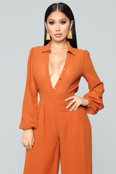 Available In Cognac Long Sleeve Button Front Lined Plus Only: Runs Small, Shop One Size Up Self/Lining: 100% Polyester Imported | Like Me Better Jumpsuit in Cognac Brown size XL by Fashion Nova Elegant Fitted Orange Jumpsuits And Rompers, Orange Fitted Elegant Jumpsuit, Elegant Fitted Orange Jumpsuit, Elegant Solid Color Button-up Jumpsuit, Chic Orange Long Sleeve Jumpsuits And Rompers, Chic Jumpsuits And Rompers With Buttons For Fall, Chic Orange Long Sleeve Jumpsuit, Fitted Jumpsuit And Romper With Button Closure And V-neck, Fitted Jumpsuit With Button Closure And V-neck