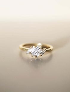 Baguette Diamond Engagement Ring - Elegant Art Deco Five Stone Ring in 14K/18K Gold - Perfect Bridal Gift for Women ✦ Handmade Item Shop ✦ Diamond: Moissanite / Lab Grown ✦ Material: 14K Solid Gold / 10K Solid Gold / 925 Sterling Silver ✦ Can Be Personalized Item ✦ If you have any questions, share with me anytime. ✦ We gladly accept custom orders too. ✦ If you cannot find the piece your heart truly desires in my shop, I promise and guarantee that I can make it for you. Just send me a picture or an illustration, and I can start a conversation about your dream piece. ՟՟՟՟՟՟՟՟՟՟՟՟՟՟՟՟՟՟՟՟՟՟՟՟՟՟՟՟՟՟՟՟՟՟՟՟՟՟՟՟՟ 💍 ✮R I N G ∙ I N F O R M A T I O N ✮💍 ՟՟՟՟՟՟՟՟՟՟՟՟՟՟՟՟՟՟՟՟՟՟՟՟՟՟՟՟՟՟՟՟՟՟՟՟՟՟՟՟՟ ➽ Stone Details :- ◈ Shape: Baguette Cut Diamond ◈ Weight: 0.30 Carat ( Approx. ) ◈ Diamond: Moissanite Simple Baguette Wedding Rings Engagement, Engagement Ring Elegant, Diamond Huggies, Ring Elegant, Elegant Engagement Rings, Baguette Ring, Bridal Gift, Baguette Cut Diamond, Elegant Art