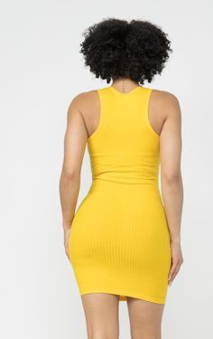 Ribbed bodycon mini dress True to size, stretch material Solid Ribbed Mini Bodycon Dress, Stretch Ribbed Mini Bodycon Dress, Stretch Ribbed Mini Dress, Trendy Ribbed Stretch Bodycon Dress, Ribbed Mini Dress For Spring, Spring Ribbed Mini Dress, Trendy Ribbed Bodycon Mini Dress, Trendy Stretch Ribbed Dresses, Yellow Knee-length Mini Dress For Night Out