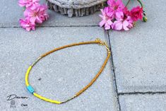 Super hippy and nice choker with gemstone bead and miyuki beads. This is a summery trend this year! The unique on this item is that it is handmade with love! On the choker sit different beads and a gemstone bead. Nice to give as a present for yourself our someone else! Also nice to combination with another chokers this summer. The choker is 37cm long + 5cm grant. ❤️ materials; Size miyuki beads: 3mm -> Colors; yellow, cactus green, hawthorne brown and champagne gold Size gemstone bead: 13x5mm an Bohemian Choker Beads For Summer, Bohemian Summer Bead Choker, Bohemian Bead Choker For Summer, Bohemian Summer Beads Choker, Bohemian Summer Choker Beads, Bohemian Heishi Beads Choker, Bohemian Heishi Beads Choker As Gift, Bohemian Gold Beaded Choker Necklaces, Bohemian Gold Beaded Choker