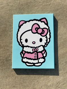 an image of a hello kitty painting on canvas