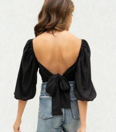 Turning Heads Ruched Bust Top – Mota Boutique Flirty Ruched Tops For Day Out, Chic Summer Tied Blouse, Chic Tied Blouse For Summer, V-neck Tie Back Crop Top For Party, Flirty Cropped Top For Brunch, Chic Tied Tops For Day Out, Casual Backless Party Tops, Flirty Ruched Tops For Brunch, Flirty Tops With Smocked Back For Brunch