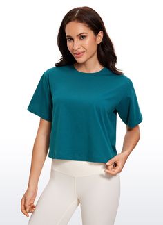 Smooth and stretchy fabric provides cotton-like breathability and softness, keeping you cool all day long. Basic cropped shirt with a loose fit and high crewneck for moving freely. Suitable for low-impact workouts, such as yoga, pilates, lounging, etc. Feature & Fitting: 
 Design for yoga 
 Waist length, relaxed fit 
 Cropped and round neck design 
 Fabric: 
 Smooth, Skin-friendly 
 Breathable, Lightweight 
 Quick dry, Moisture wicking 
 Anti-pilling and Durable 
 70%Cotton, 30%Polyester 
 S