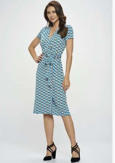 Proudly Made in USA Add a feminine touch to any wardrobe with this stunning jersey wrap dress! Featuring a wrap design and midi length, you'll be turning heads in no time. With a flattering V-neck and short sleeves, plus a tie at the waist for a perfect fit. Topped off with a unique tulip pattern, this dress will give you an air of class wherever you go! Wrap Dress Design Midi Length V-Neck Short Sleeves Tie at Waist Lightweight Jersey Material Colors: Aqua, Orange, Black & White Beautiful Uniqu Flattering V-neck Wrap Dress For Summer, Summer Viscose V-neck Wrap Dress, Rayon Midi Dress With Tie Waist, Chic Rayon V-neck Wrap Dress, Knee-length Rayon Dress With Tie Waist, Chic Rayon Wrap Dress With V-neck, Chic V-neck Rayon Wrap Dress, Fitted Viscose V-neck Midi Dress, V-neck Rayon Midi Dress With Tie Waist