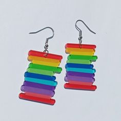 Gorgeous Rainbow Pride Earrings 🏳️🌈 Express your pride with our stunning Rainbow Pride geometric earrings! Made with vibrant colors and modern designs, these earrings are perfect for celebrating love and equality. Get yours now and shine bright with pride!  ️️ Rainbow Drop Earrings With Ear Wire, Trendy Rainbow Hypoallergenic Earrings, Playful Hypoallergenic Rainbow Earrings, Fun Rainbow Drop Earrings, Fun Rainbow Colored Earrings As Gift, Playful Rainbow Earrings With Ear Wire, Playful Multicolor Ear Wire Earrings, Playful Multicolor Earrings, Fun Rainbow Earrings