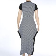 Fashioned from excellent quality polyester that will last for a long time, this stunning plus size dress promises to keep you looking and feeling fabulous this summer. Designed for casual wear, this ankle-length dress displays a black and white striped pattern that is further accentuated by its alluring split style. Available in sizes up to 6XL, this loose fit apparel features an O-neck and short sleeves for extra comfort!

Specifications
Brand Name: GeraldBlack
Material: Polyester
Silhouette: L Split Dresses, Plus Size Summer Casual, Summer Formal Dresses, Big Size Dress, Sundress Casual, Split Long Dress, Dress Display, Beach Wedding Dress Boho, Ankle Length Dress