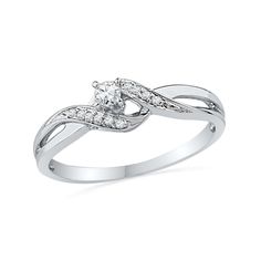 a white gold ring with diamonds on it