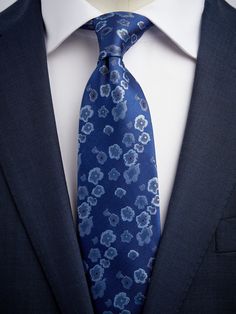 Men’s floral ties –  Floral tie made in Italy. A floral tie can be fun yet elegant, perfect for a party or casual Friday at the office. A couple of floral ties should be pieces in every man’s wardrobe. When opting to go for a floral tie, you really have the chance for personal expression. One important tip is to go for what type of pattern you like, as long as the colors work well with both shirt and blazer.   All our floral ties are made in Italy. Pin Collar Shirt, Sleeve Garter, Canvas Laptop Bag, Floral Ties, Light Blue Tie, Types Of Patterns, Bow Tie Wedding, Tuxedo Shirts, Blazer Shirt