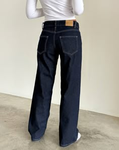 Your new denim obsession. Our Parallel jeans, in a indigo wash, feature a low rise fit with a straight leg, 5 pockets, branded back tab, branded button and rivets.   Paired with our Amabon top.    NOW AVAILABLE IN THREE LEG LENGTHS.   MODEL WEARS: W26/32L - MODEL HEIGHT:5'7