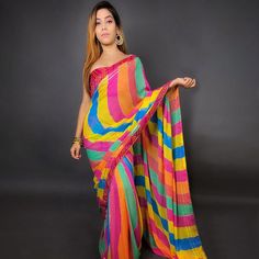 This multicolored saree is prettified with stripes printed and gota work as shown which makes it appear classy. This saree is made of georgette fabric which is accompanied with unstitched banglori silk blouse piece which you can customise as per your design/style. Women can buy this suit to wear for their festive and function. Note:- The actual product may differ slightly in color and design from the one illustrated in the images when compared with computer or mobile screen. Measurements: Saree Festive Multicolor Unstitched Pre-draped Saree, Bollywood Style Multicolor Pre-draped Saree For Navratri, Bollywood Multicolor Pre-draped Saree For Navratri, Festive Multicolor Pre-draped Saree With Unstitched Blouse, Multicolor Pre-draped Saree With Zari Work, Multicolor Mirror Work Pre-draped Saree For Navratri, Multicolor Pre-draped Saree For Diwali, Multicolor Unstitched Blouse Piece, Multicolor Semi-stitched Cutdana Blouse Piece