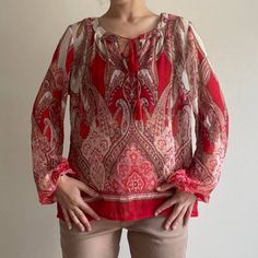 Red Nwt Printed Paisley Blouse Adorable Bohemian Eccentric Long Sleeved Shirt Beautiful Vibrant Print In Red & White Ties At The Top , Keyhole Neck Floral / Mandala / Boteh Motifs Tiny Linework Pattern Brand New With Tags , Deadstock Brand Rose & Olive Size Xs Modeled On A Medium 100% Polyester Fits Hippiecore / Boho / Fairycore / Business Casual Aesthetic (K) Summer Red Blouse With Paisley Print, Red Bohemian Blouse With Paisley Print, Red Bohemian Tops With Paisley Print, Red Long Sleeve Blouse With Paisley Print, Red Bohemian Paisley Print Tops, Red Paisley Print Summer Top, Red V-neck Blouse With Paisley Print, Casual Red Tops With Paisley Print, Casual Red Paisley Print Top