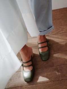 - Square toe- Wood cylinder heel- Button detail mary jane style mule- Tonal stitch- Slips on Measurements(in.)- Heel: 2.4"- Size: KR225(US5.5)-KR250(US8.0)Composition - Sheep skinDesigner- Imported- by FEBRUARY SECOND- Style#:300427735 Spring Mary Jane Heels For Work, Spring Mary Jane Workwear Heels, Spring Workwear Mary Jane Heels, Spring Workwear Mules With Square Toe, Green Mules Outfit, Spring Mary Janes With Padded Heel, Pointed Toe Mary Janes With Heel Loop For Spring, Mary Jane Shoes For Spring Workwear, Spring Heels With Penny Strap And Square Toe