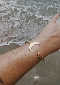 Adjustable raw brass cuff bracelet featuring a crescent moon face and a sun with a sunstone gemstone center. One size fits most. Crescent Moon Face, Boho Celestial, Brass Cuff Bracelet, Moon And Star Earrings, Cape Canaveral, Moon And Sun, Brass Cuff, Angel Aura Quartz, Moon Face