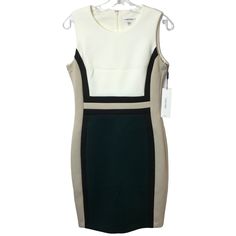 Calvin Klein Women's Sleeveless Color Block Sheath Dress (Size 8) Color: White/Beige/Green 92% Polyester, 8% Spandex Zipper Closure Dry Clean Only New W/ Tags Features: Sheath Dress Size: Womens 8 Condition: New With Tags New W/ Tags White Knee-length Sleeveless Dress For Work, White Bodycon Sheath Sleeveless Dress, White Sleeveless Knee-length Dress For Work, Calvin Klein Sleeveless Dress For Spring Workwear, Calvin Klein Sleeveless Dress For Summer Workwear, Calvin Klein Sleeveless Formal Dress For Summer, Chic Green Calvin Klein Dress, Calvin Klein Sleeveless Sheath Dress For Spring, Calvin Klein Sheath Sleeveless Dress For Work