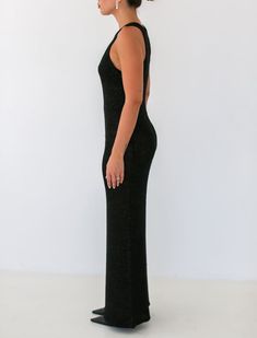 A revamped knit maxi dress featuring a sultry, semi-sheer fabric that’s sprinkled with micro sequins. Chic Floor-length Sequin Dress For Party Season, Fitted Floor-length Glitter Dress, Glitter Fitted Floor-length Dress, Sequin Stretch Maxi Dress For Night Out, Sequin Floor-length Maxi Dress For Night Out, Stretch Sequin Maxi Dress For Night Out, Chic Sequin Floor-length Dress For Night Out, Chic Floor-length Sequin Dress For Night Out, Glitter Fitted Maxi Evening Dress